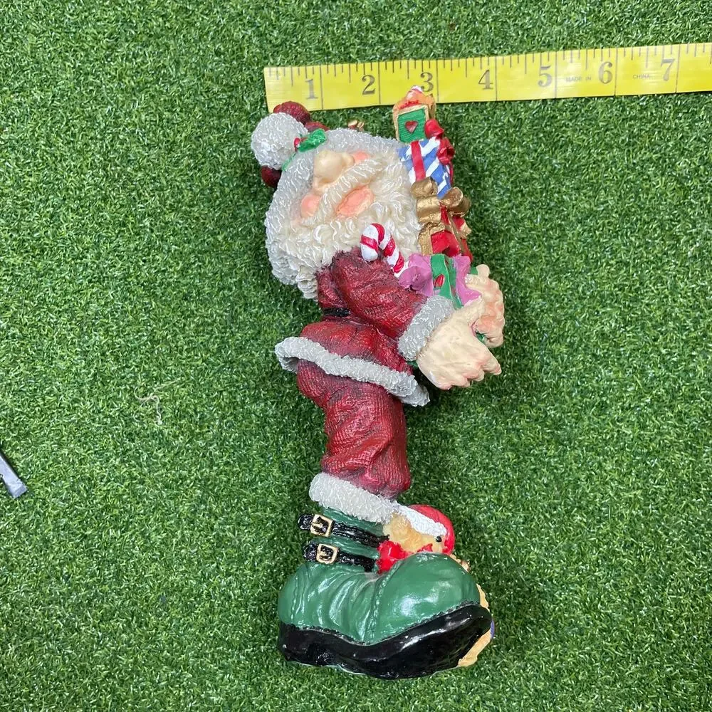 Resin Santa Holding Christmas Presents Figurine 9
